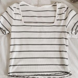 white crop top with black stripes